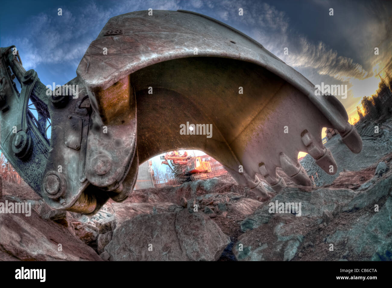 Scoop of the excavator close up. Part of land vehicle. Stock Photo
