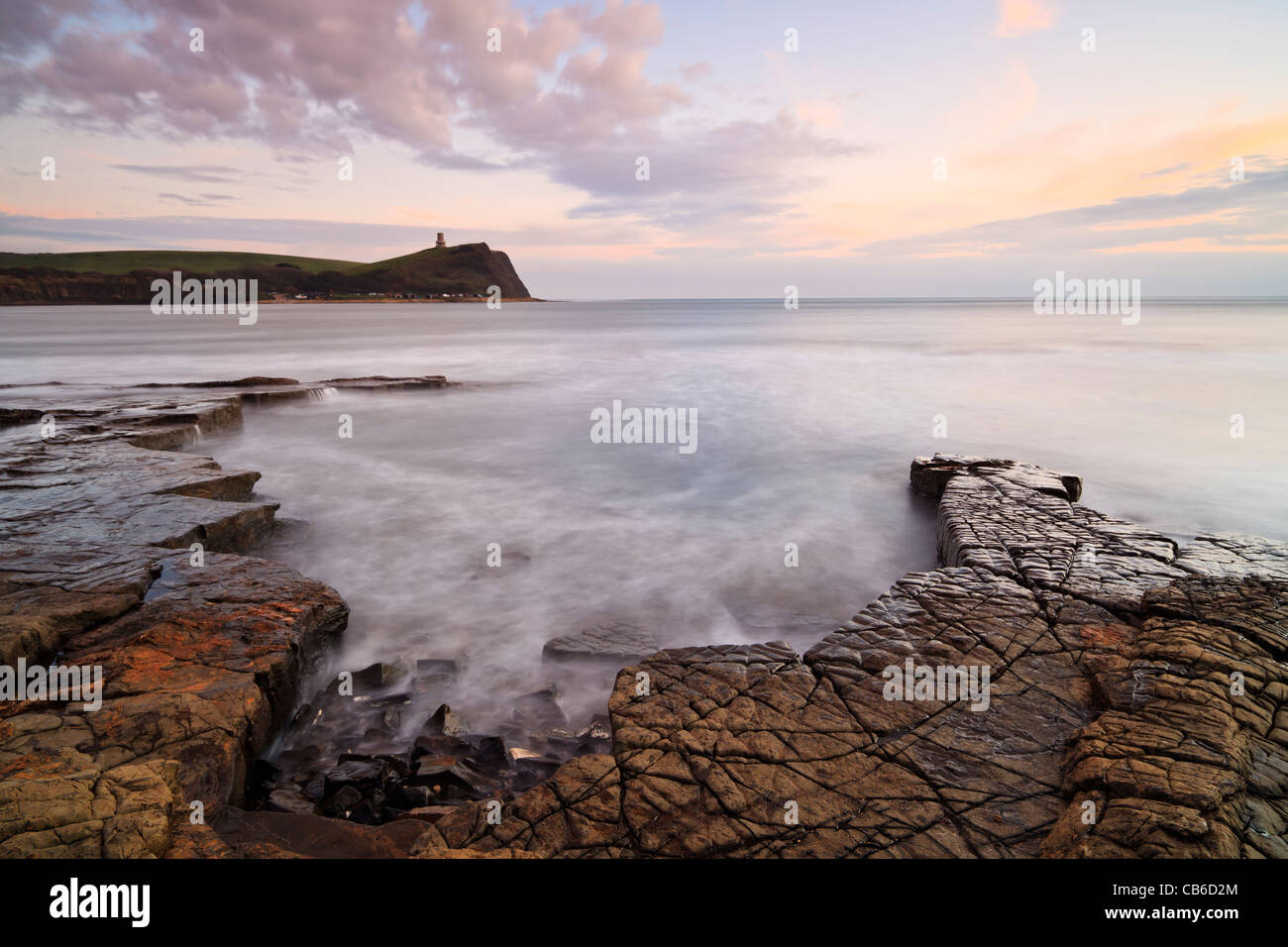 Kimmeridge Bay, Dorset, UK, with Clavell's Tower in the background, at sunset Stock Photo