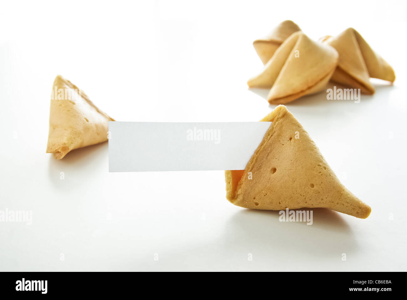 Asian fortune cookies with blank paper isolated on white background