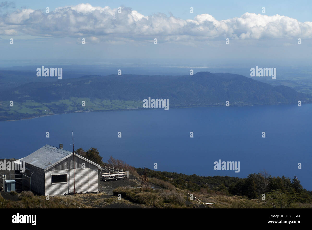 Panoramic View. House at Osorno Vulcano. De Todos los Santos lake, Vicente Perez Rosales National Park, Lake's District, Chile Stock Photo