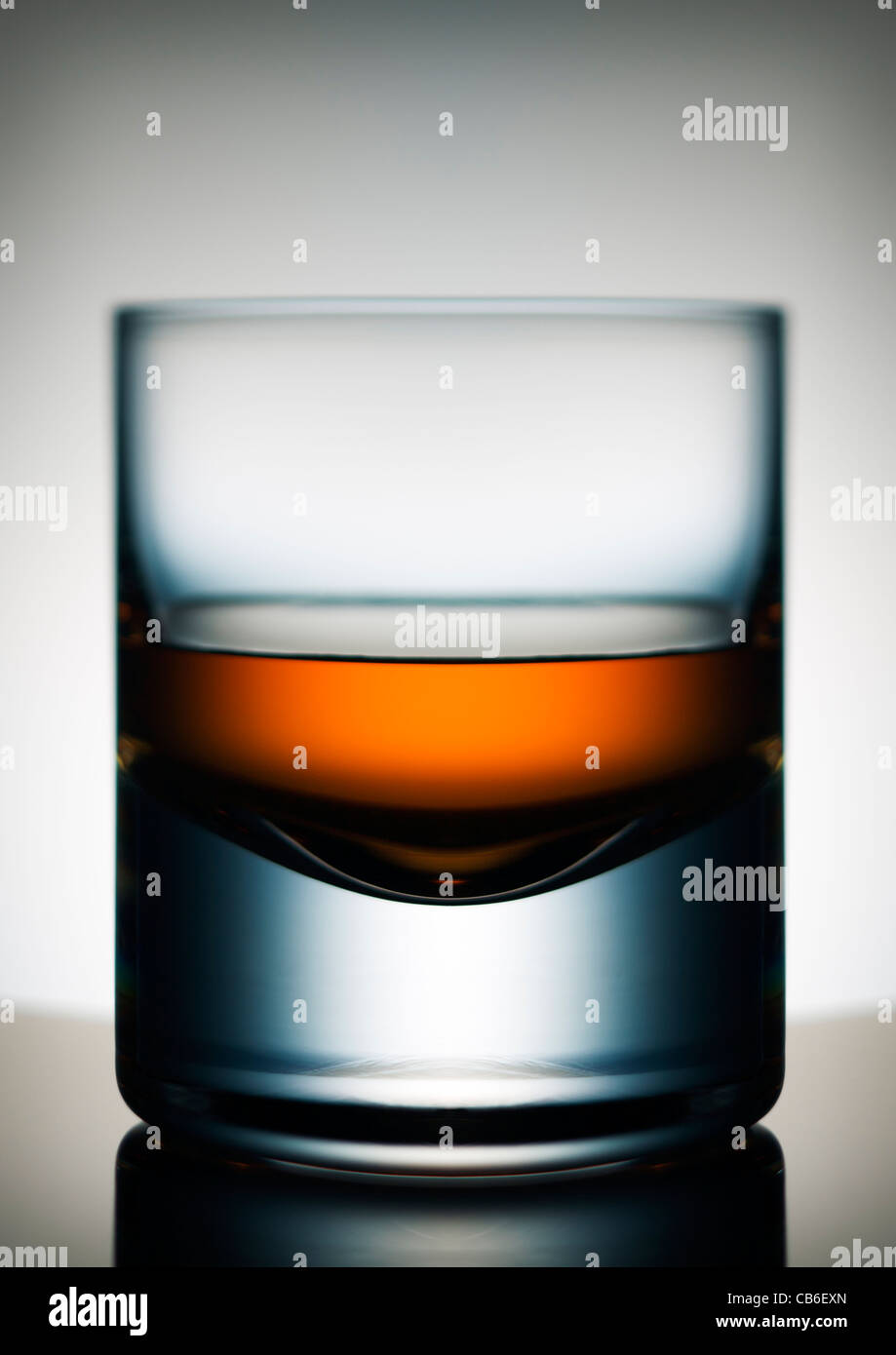 Backlit tumbler of whiskey Stock Photo Alamy
