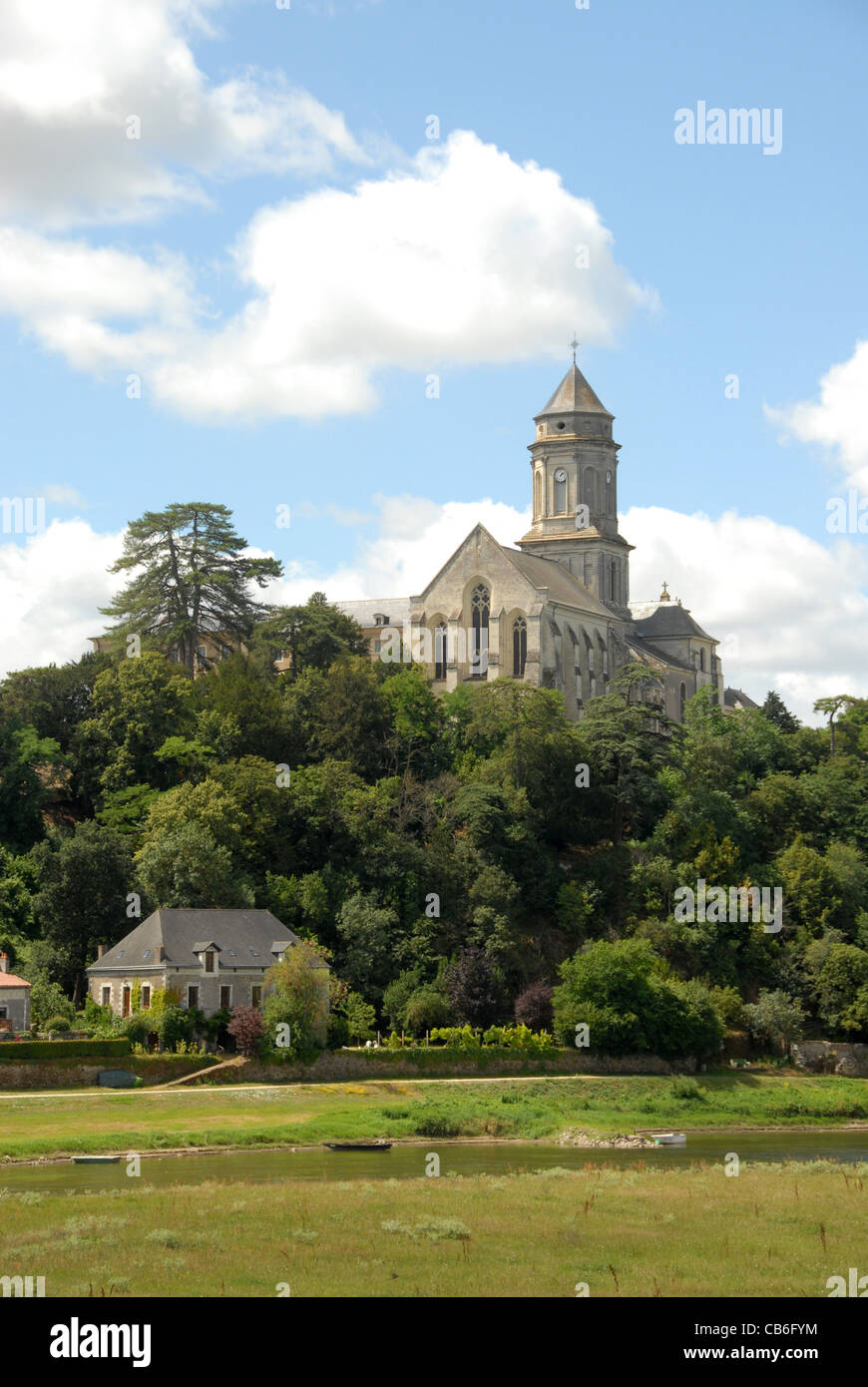 Abbey of St-Florent-le-Vieil in the Lore valley, a UNESCO world heritage, seen from the river flats Stock Photo
