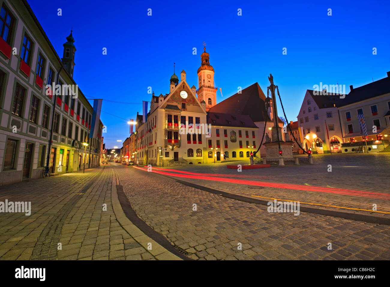 Facade of the medieval city of Freising Rathaus (Town Hall) and bell tower of St George's Church in the Marienplatz seen from alo Stock Photo