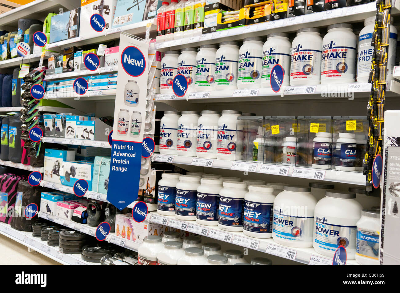 Fitness shakes and keep fit equipment for sale on shelves in a Tesco Store Stock Photo Alamy