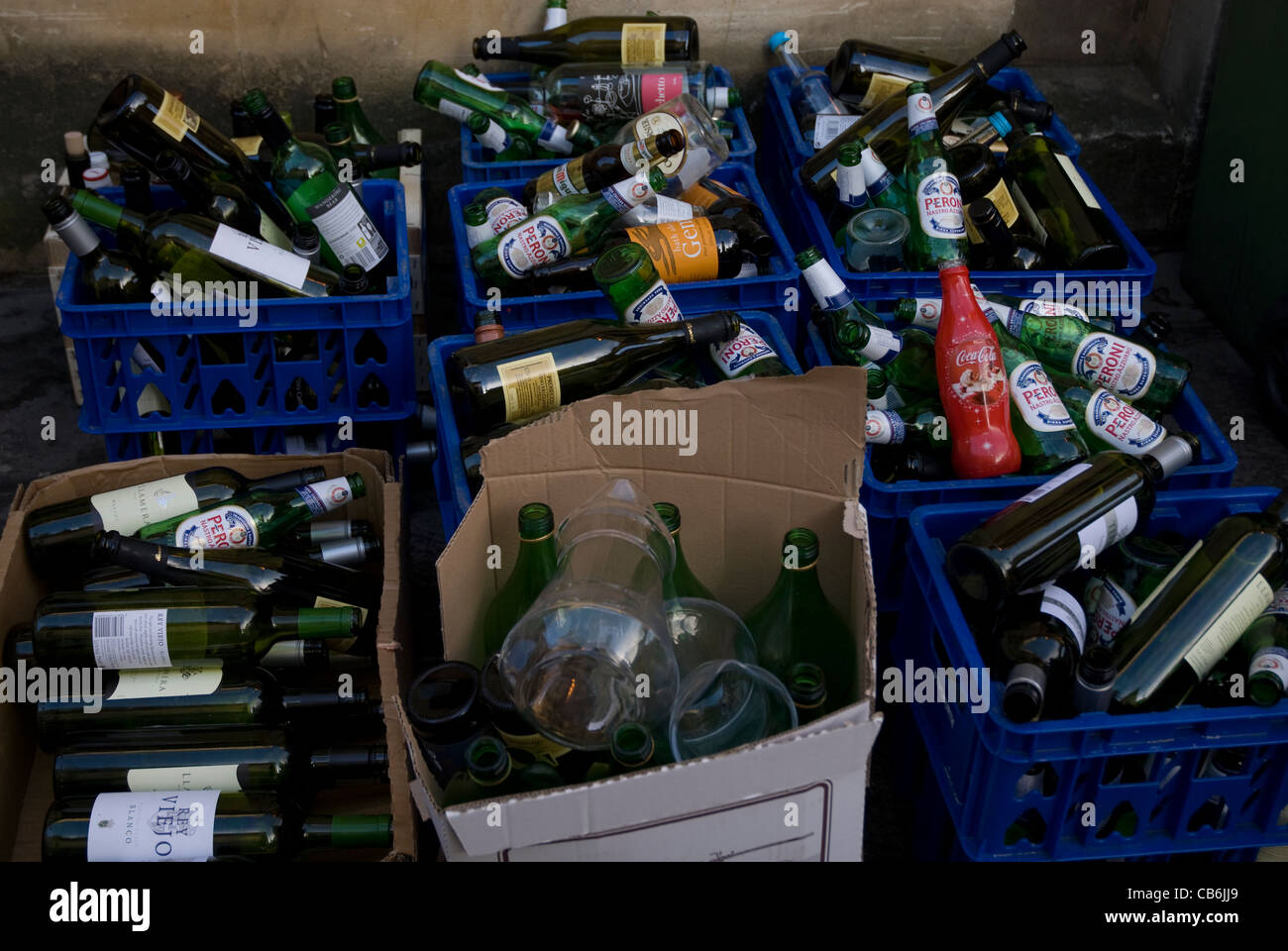Boxes of empty drink bottles waiting for recycling, Bath Spa England UK Stock Photo