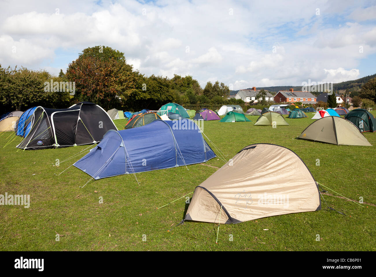 Camping field at edge of town Wales UK Stock Photo