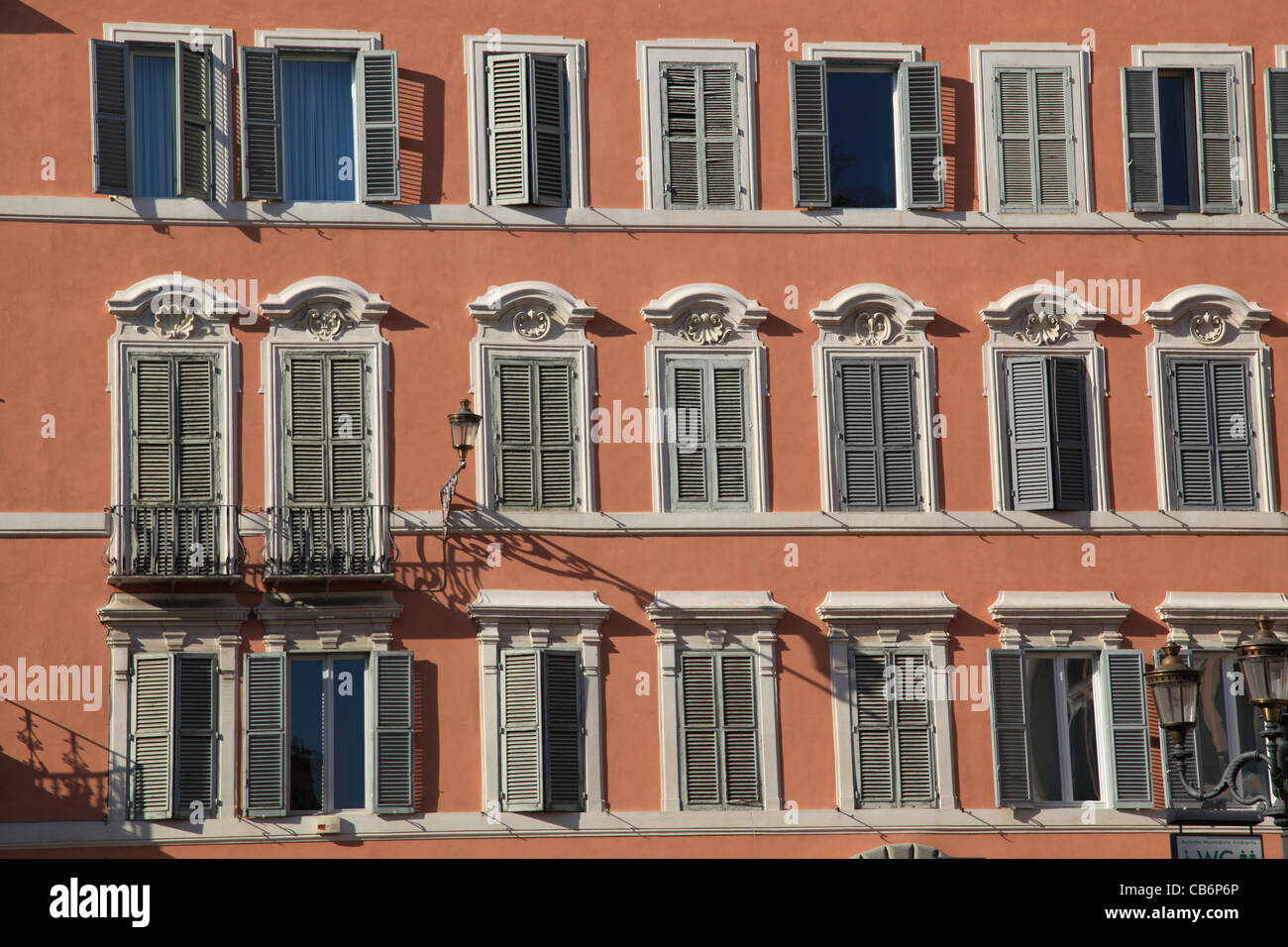 Windows of a typical apartment building in Rome Stock Photo