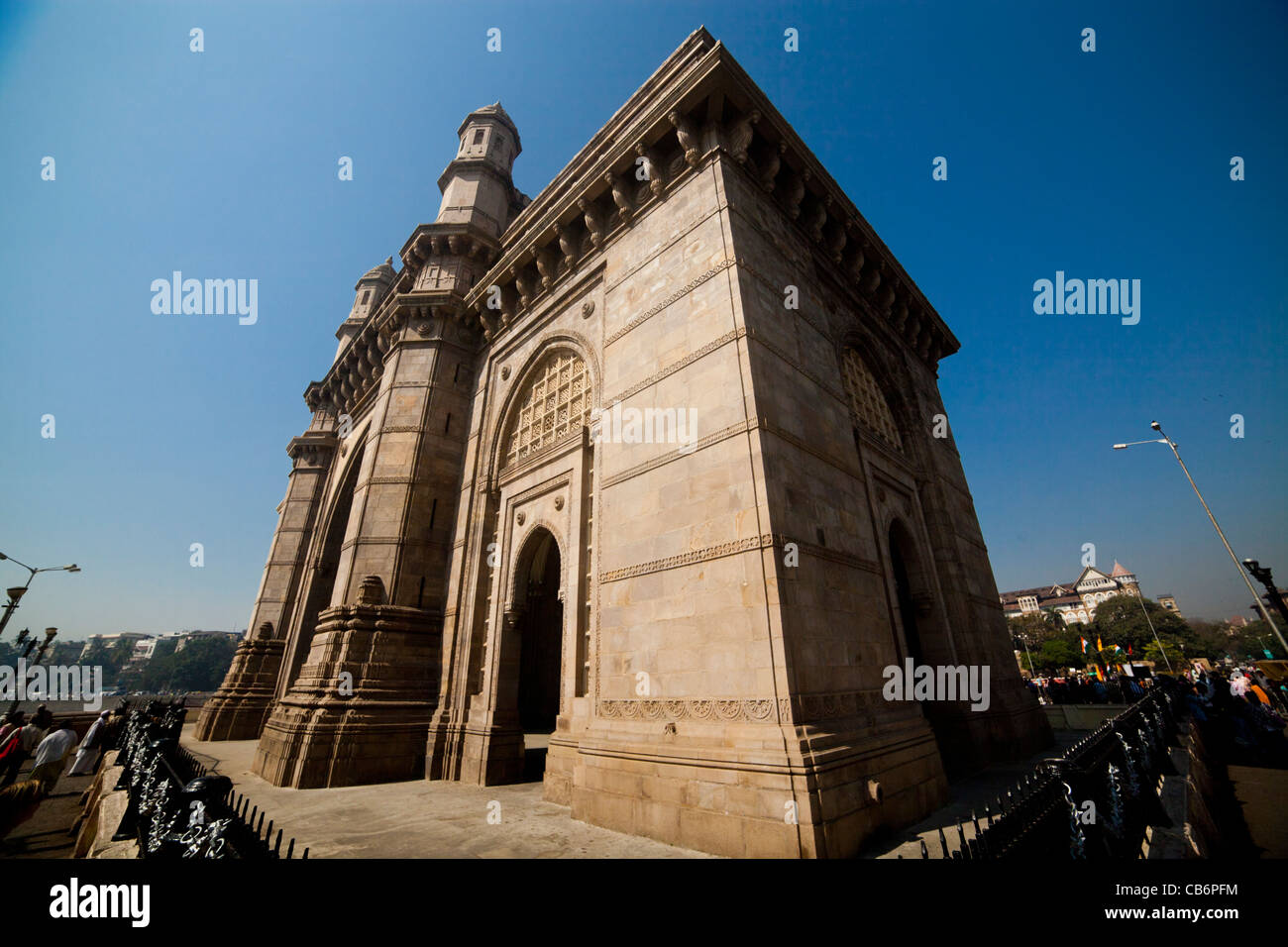 Tourists and locals outside gateway to India Stock Photo
