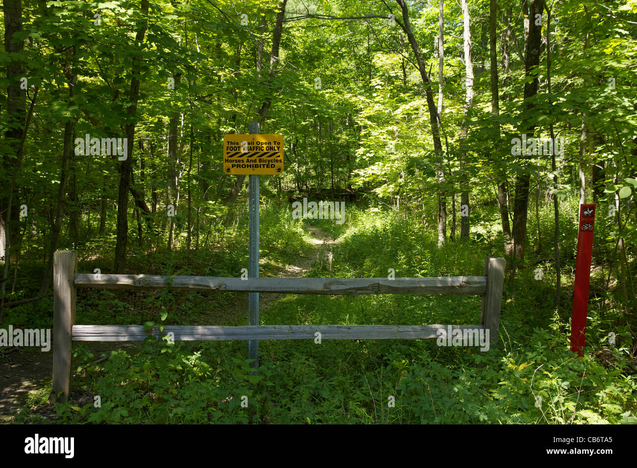 Trail closed to bicyclists and equestrians due to environmental damage. Deer Grove Forest Preserve. Cook County, Illinois. Stock Photo