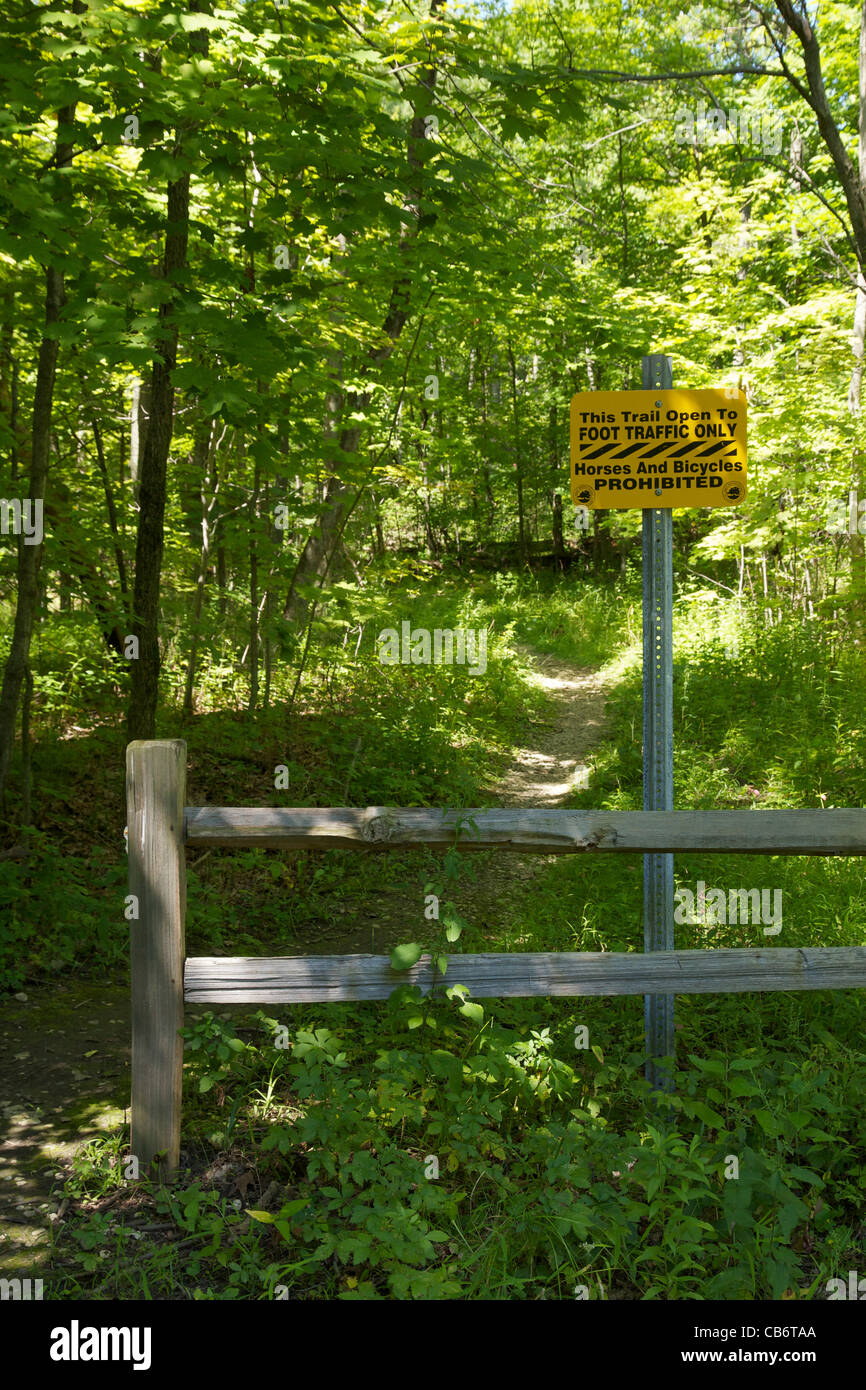 Trail closed to bicyclists and equestrians due to environmental damage. Deer Grove Forest Preserve. Cook County, Illinois. Stock Photo