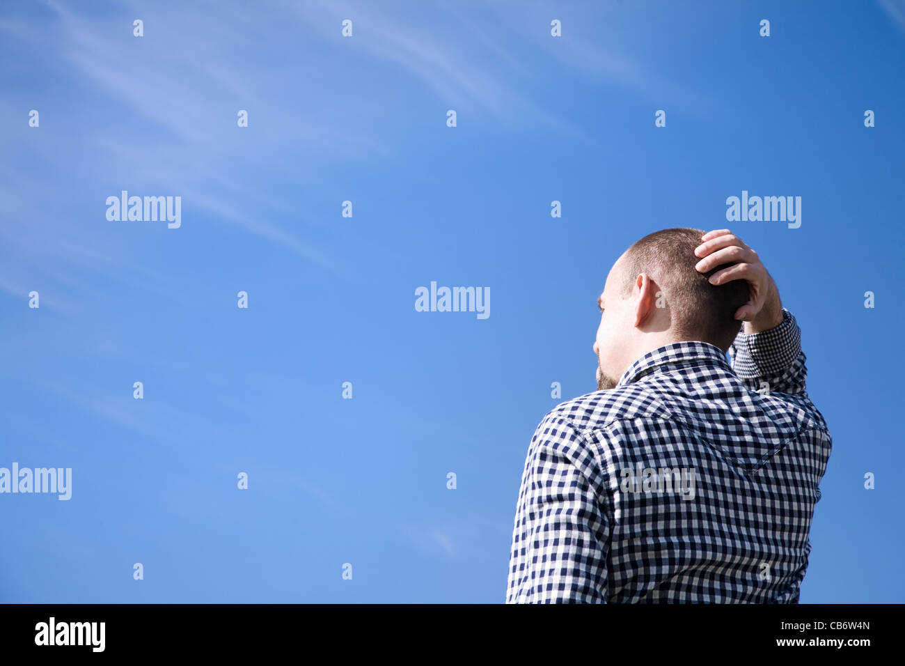 man on blue sky background with empty space for text or design Stock ...