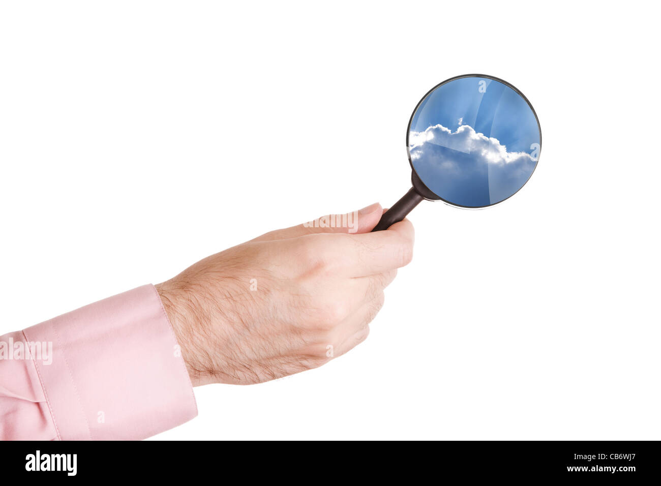 hand of man with loupe isolated on white background and sky landscape ...