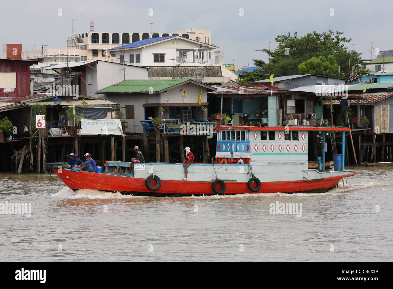 Boat traffic on the Chao Phraya River at Bangkok, Thailand Stock Photo ...
