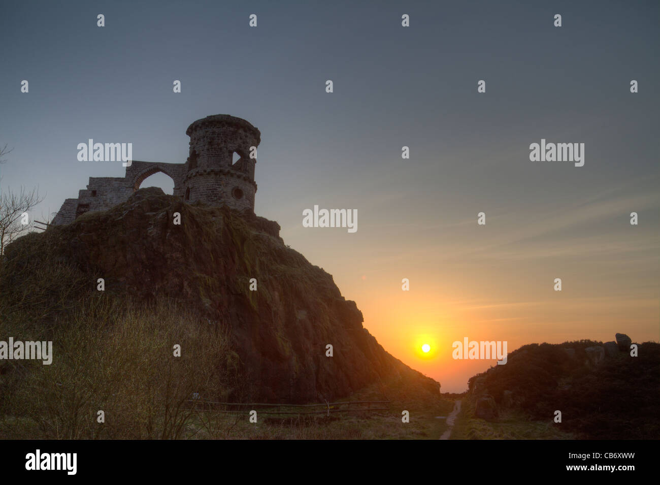 sunset at Mow Cop castle Stock Photo