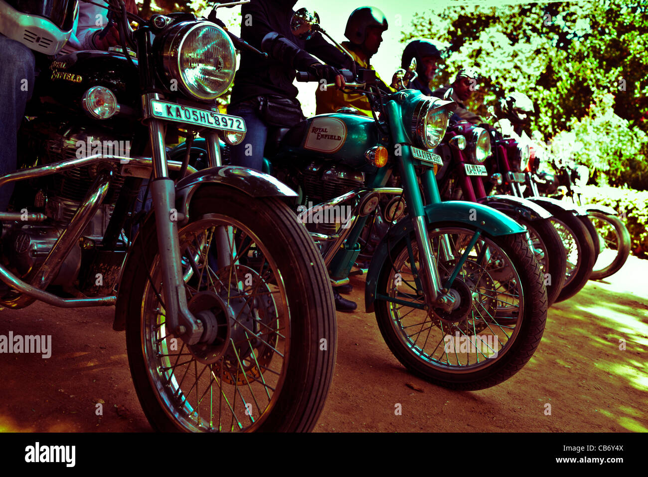 hampi ruins motorbikes riders indian enfield Stock Photo - Alamy
