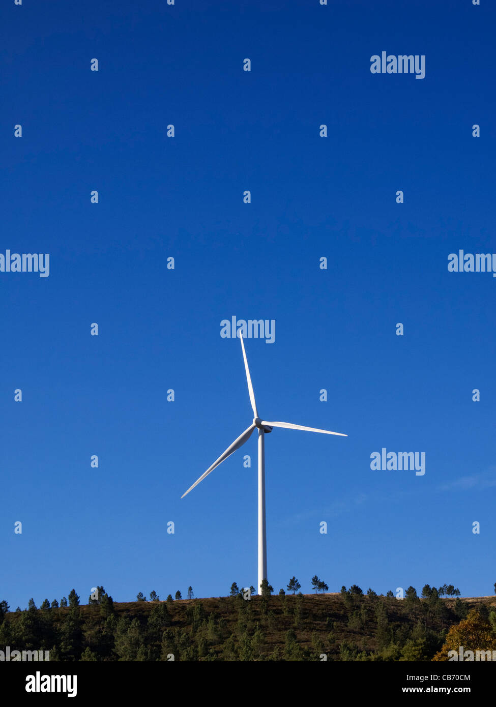 Wind turbine and blue sky Stock Photo - Alamy