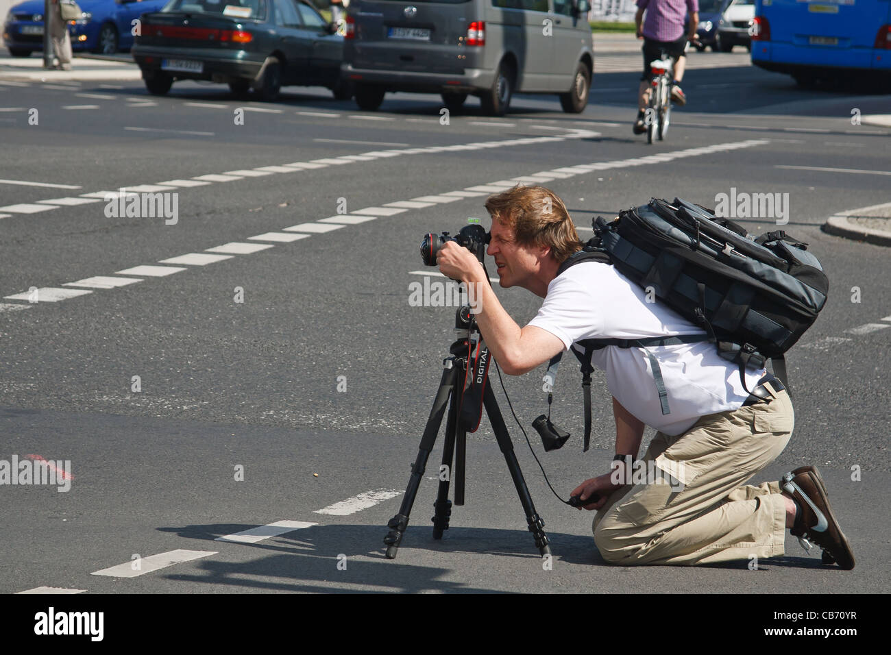 Photographer taking picture at street,. Potsdamer Platz, Berlin ...