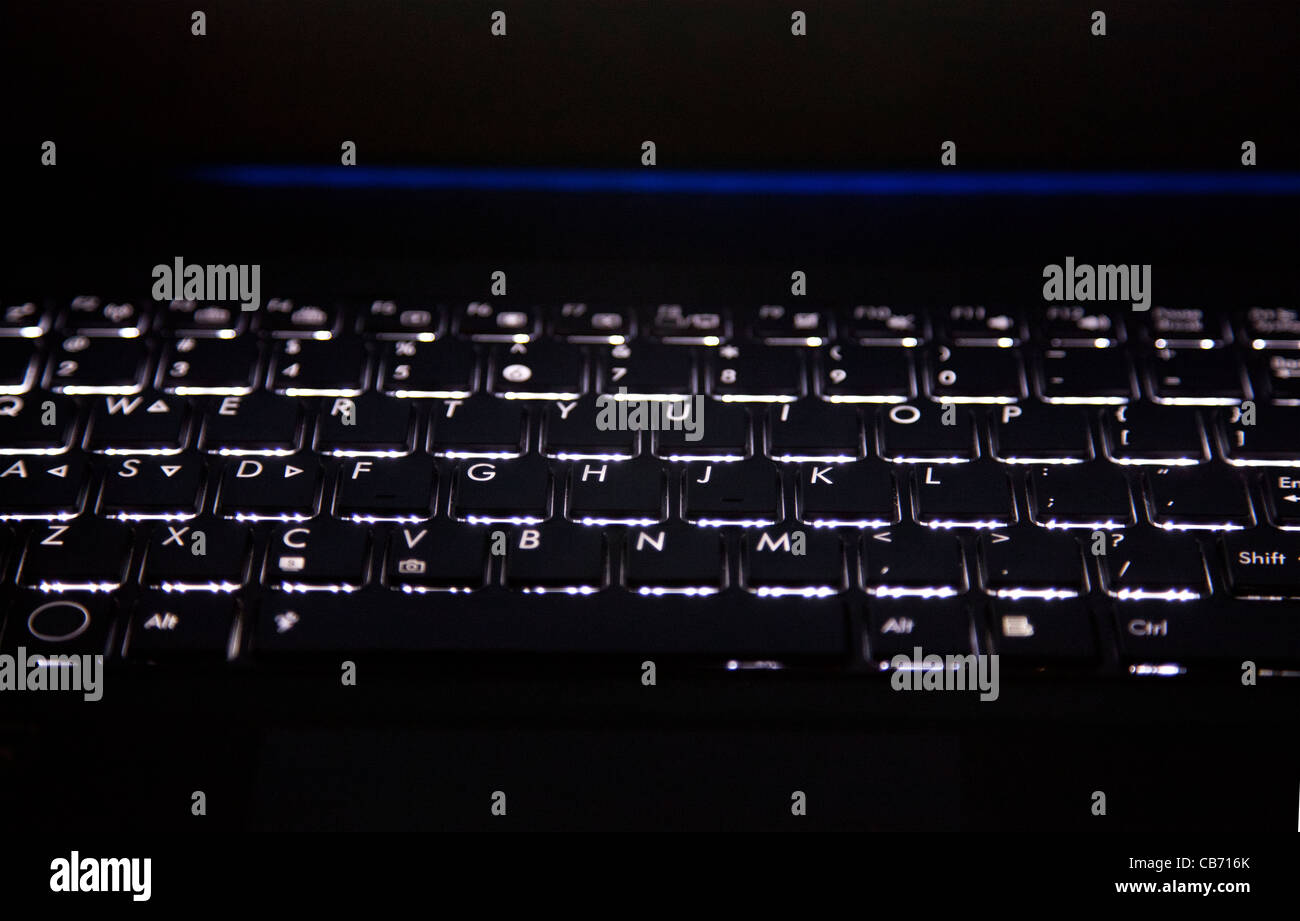 Lit Keyboard on Laptop Stock Photo