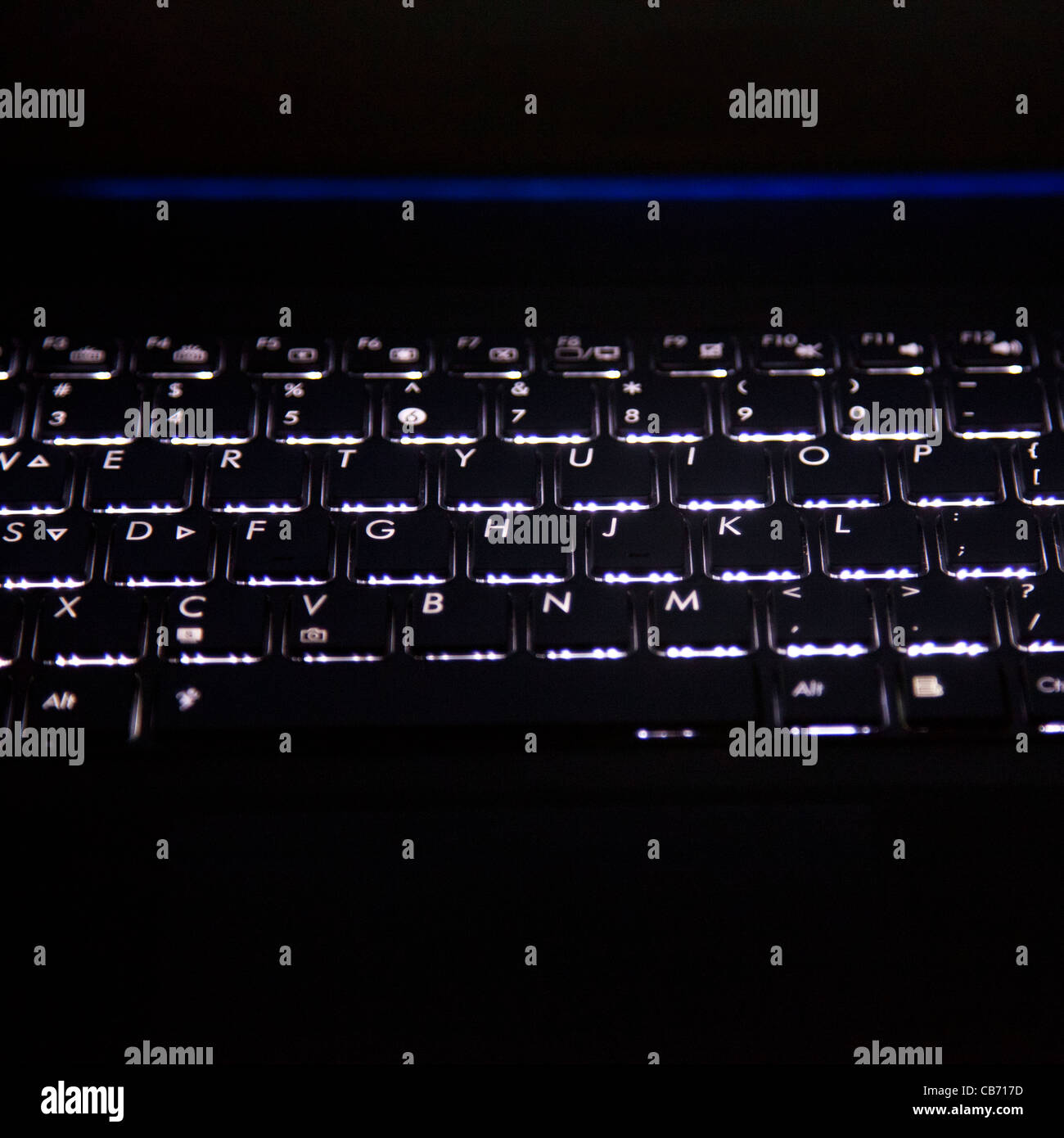 Lit Keyboard on Laptop Stock Photo