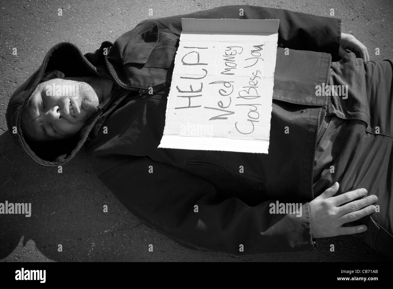 Homeless Without Color Homeless person with cardboard Black and White Stock Photos & Images ...