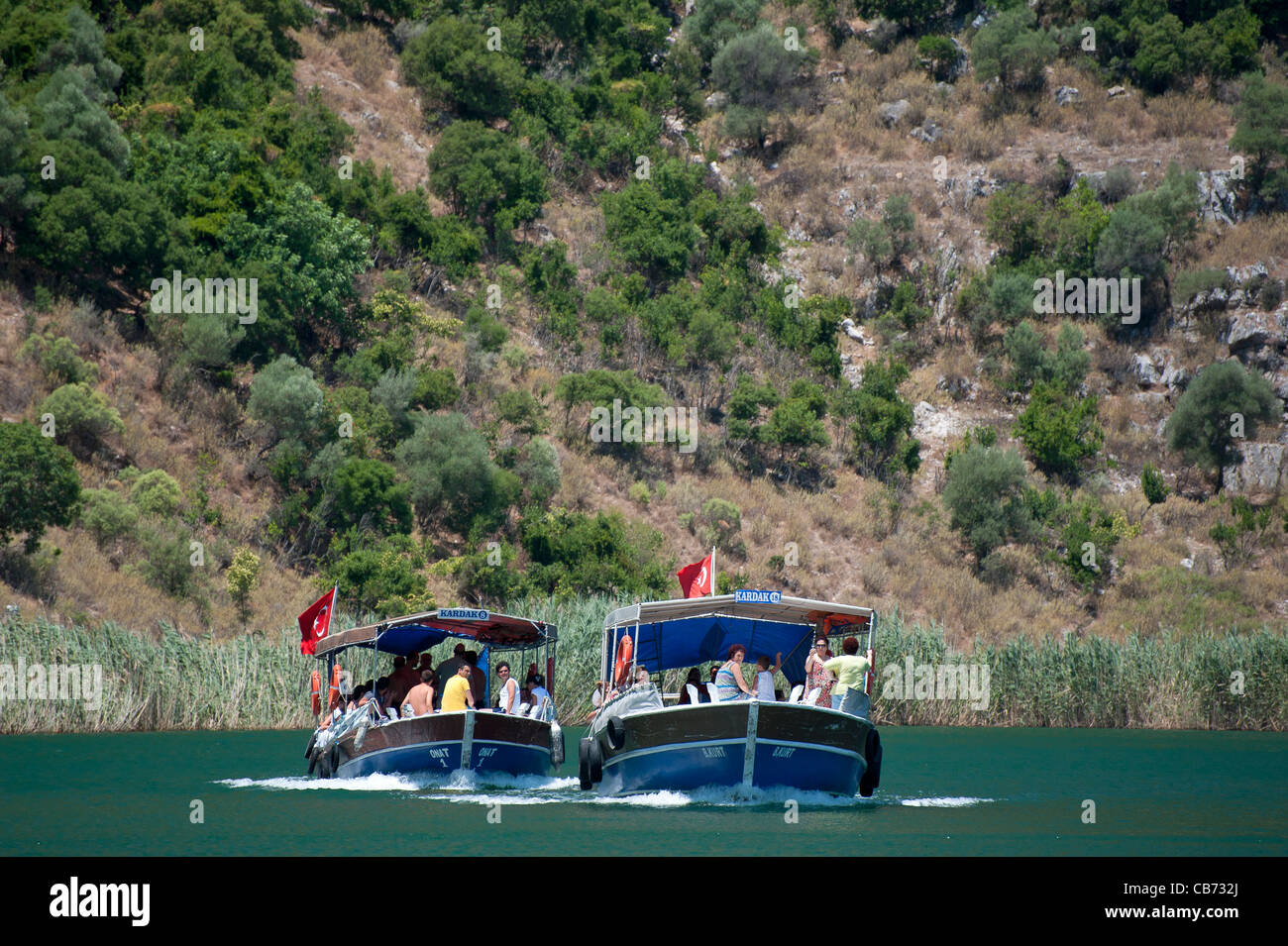 Boat trips in Dalyan River Fethiye Turkey Stock Photo