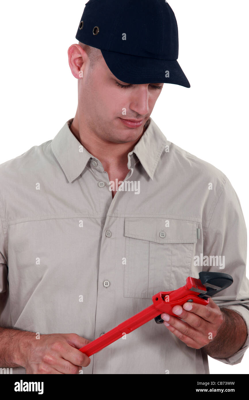 Handyman holding a vernier caliper Stock Photo