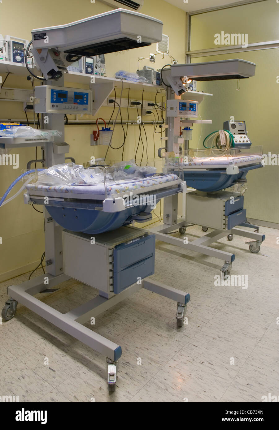 Two Modern Incubators In Maternity Recovery Room Stock Photo
