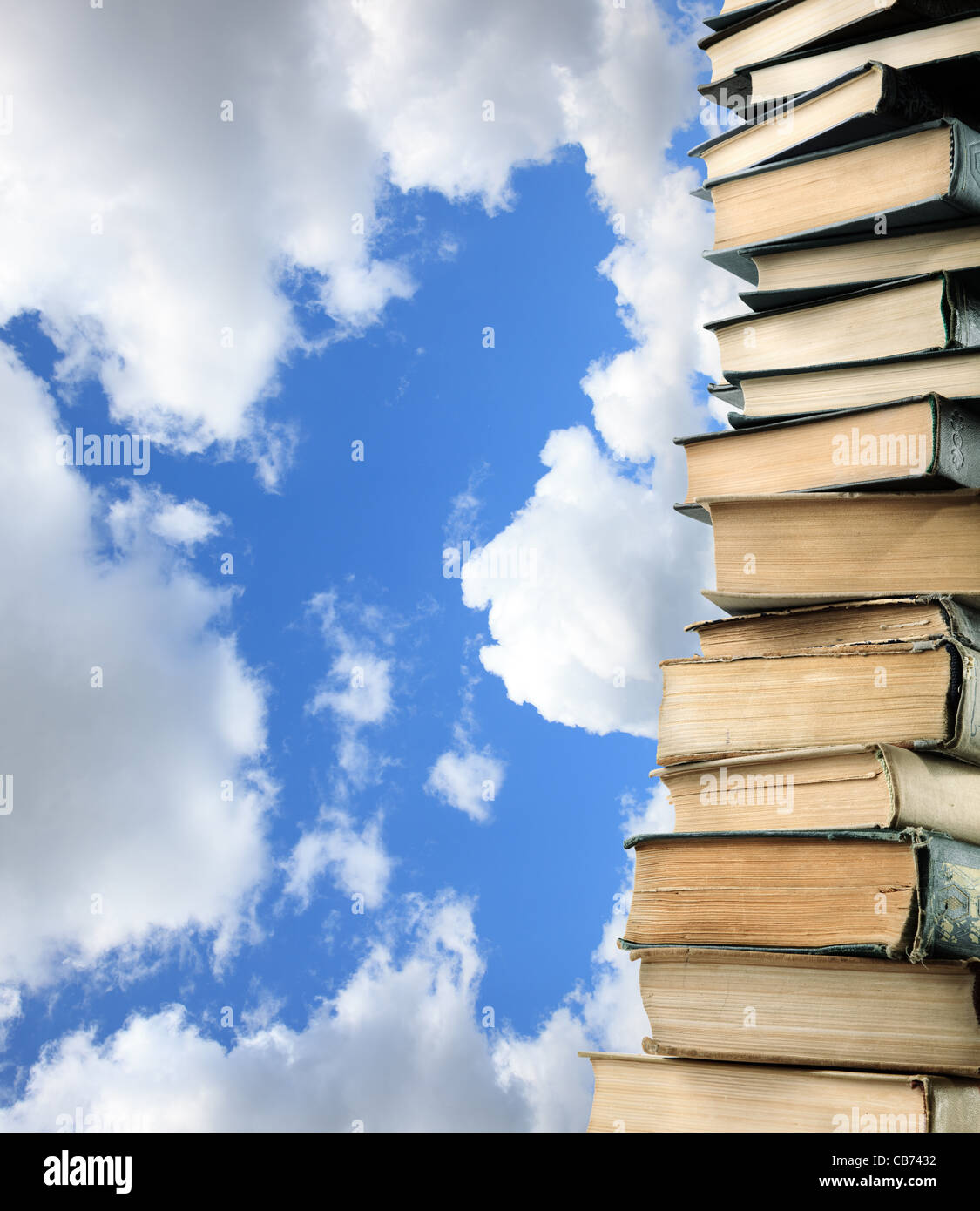 many books on blue sky background, selective focus Stock Photo - Alamy