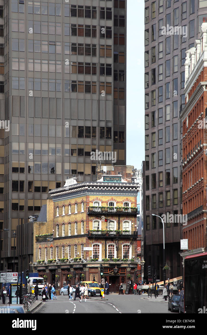 The Albert on Victoria Street, A traditional, Victorian  London Pub dwarfed by modern tower blocks Stock Photo