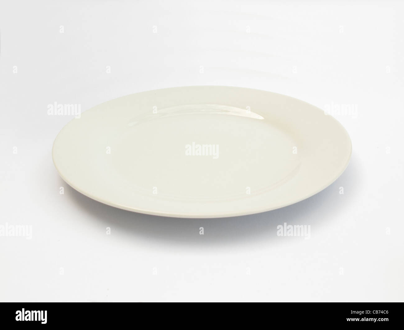 white china dinner plate white background  pure plain bright  empty clean nobody Stock Photo