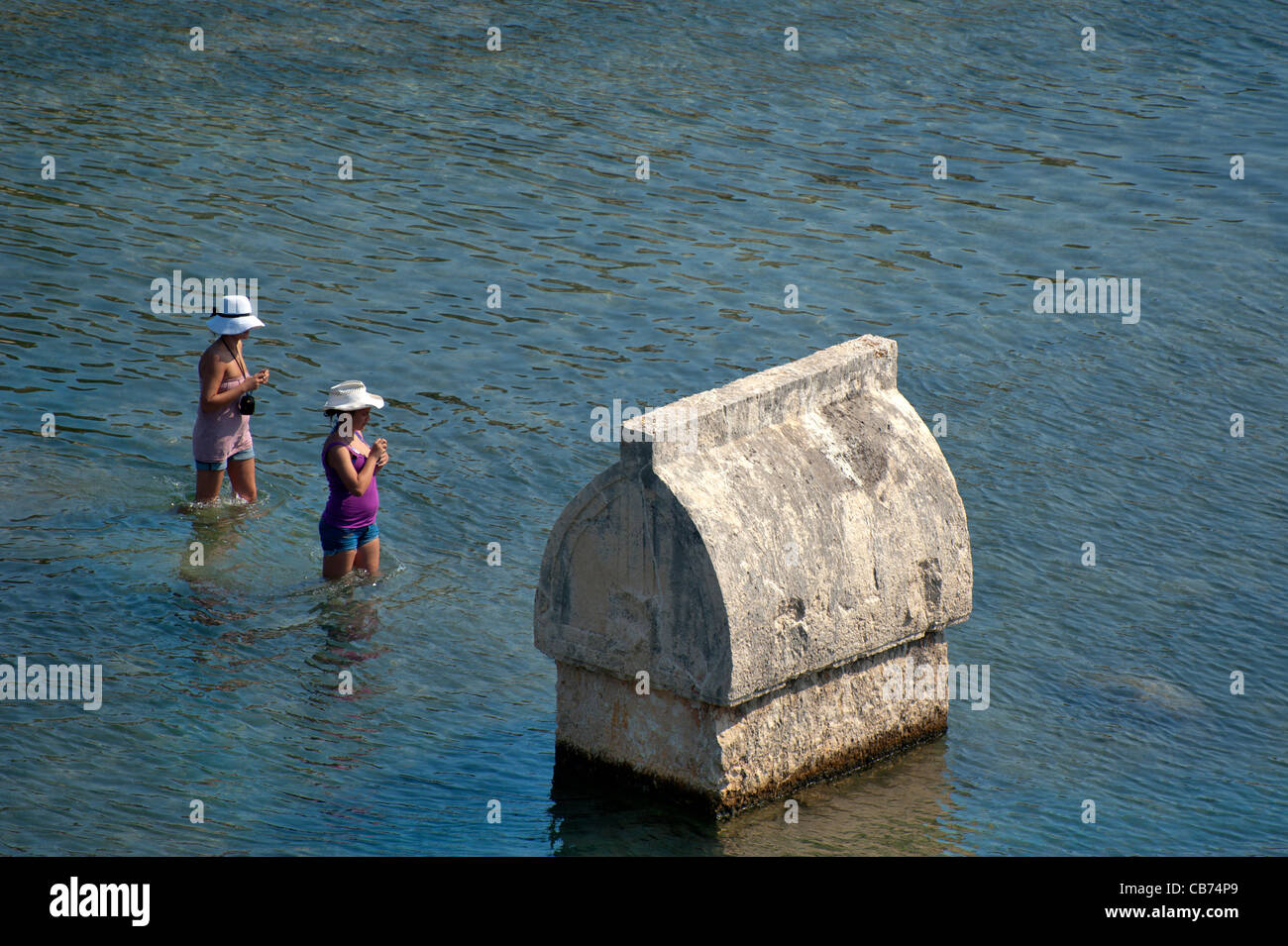 Lycian tomb in the sea Teimioussa, Ucagiz, Kalekoy Simena Turkey. Stock Photo