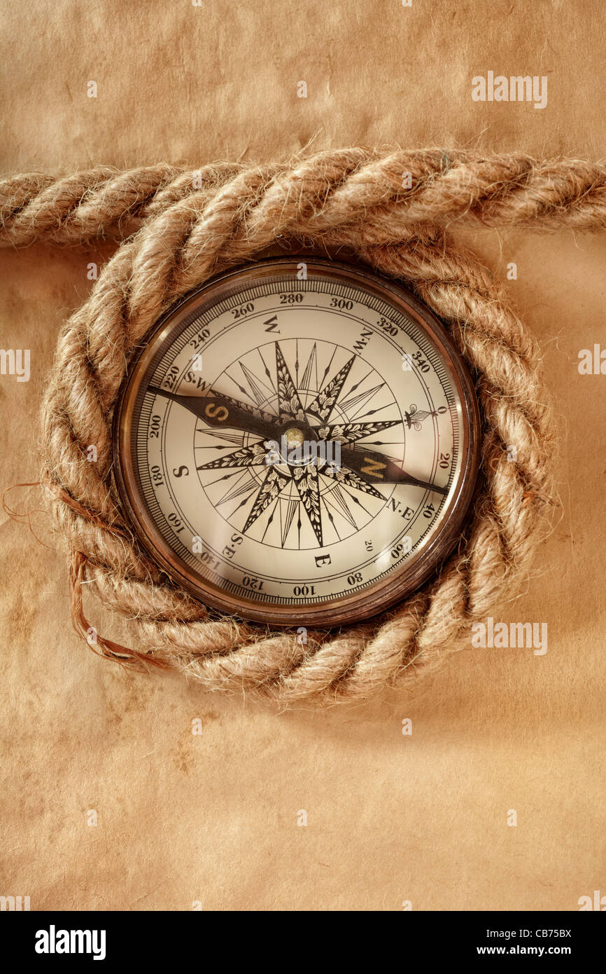 old paper ,marine compass and rope , selective focus Stock Photo Alamy