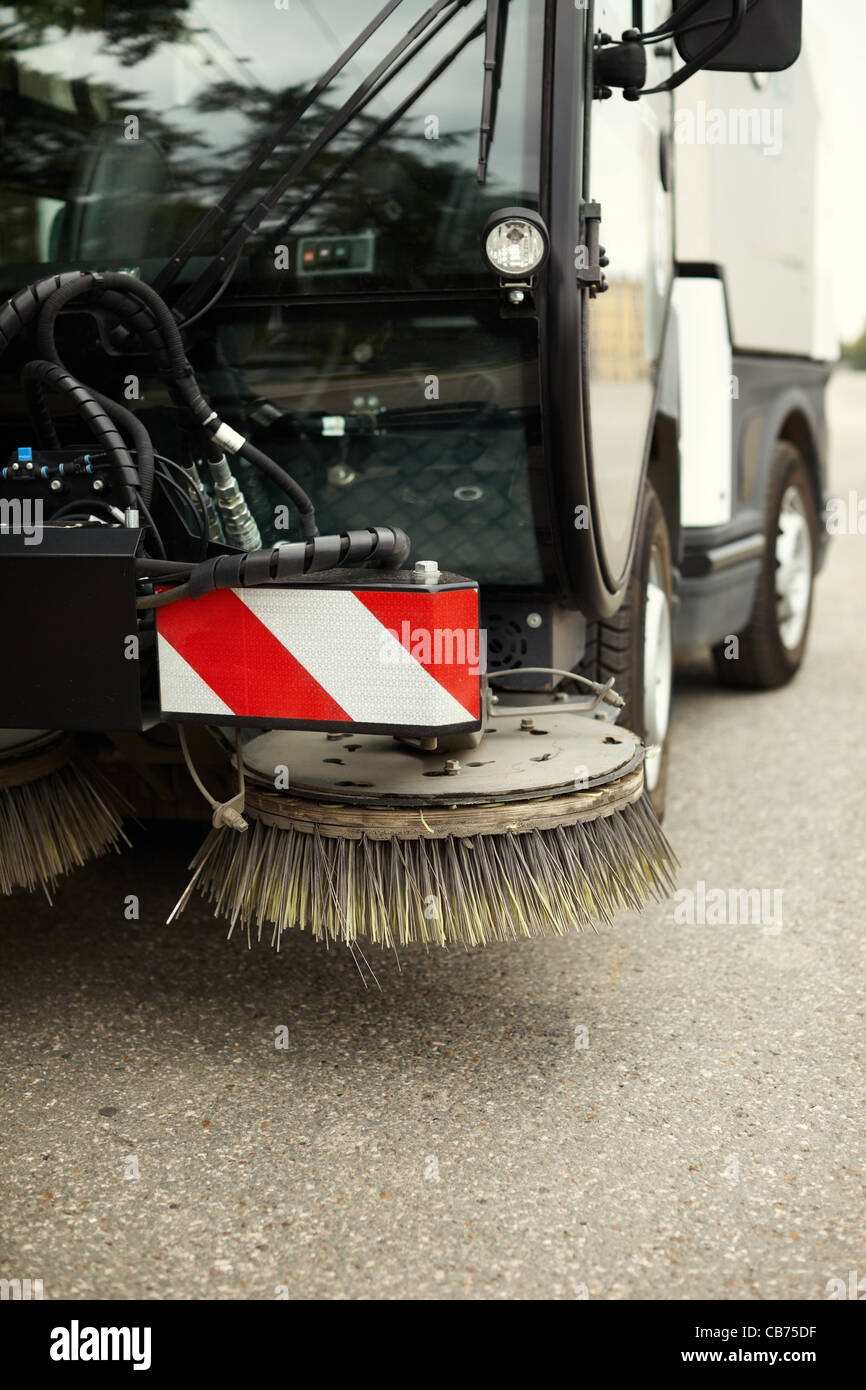 part of street sweeper, selective focus on nearest part Stock Photo