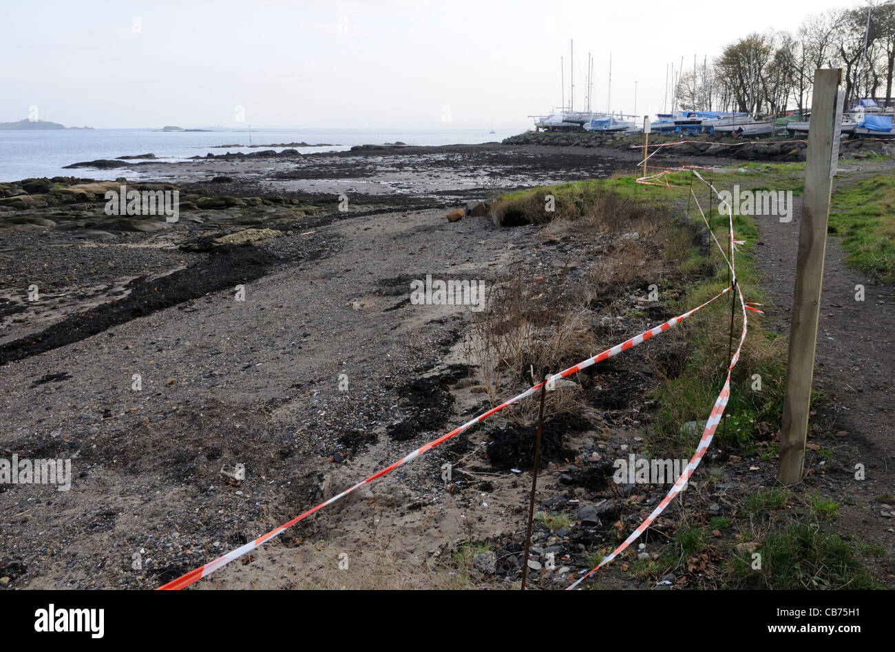 16th November 2011. The beach to the north of Dalgety Bay Sailing club has been cordoned off due to radioactive contamination. Stock Photo