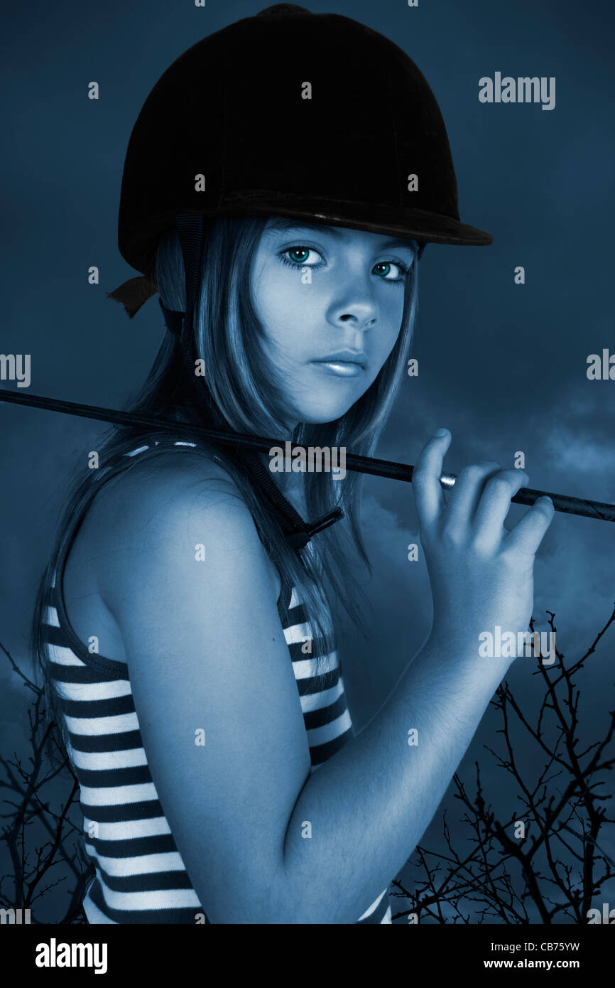 Girl Child Wearing Riding Hat Holding Whip Stock Photo Alamy