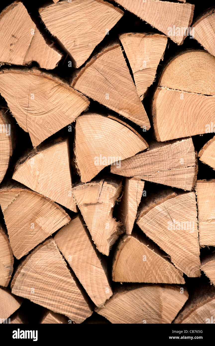 Fire wood stacked up to dry before burning Stock Photo Alamy