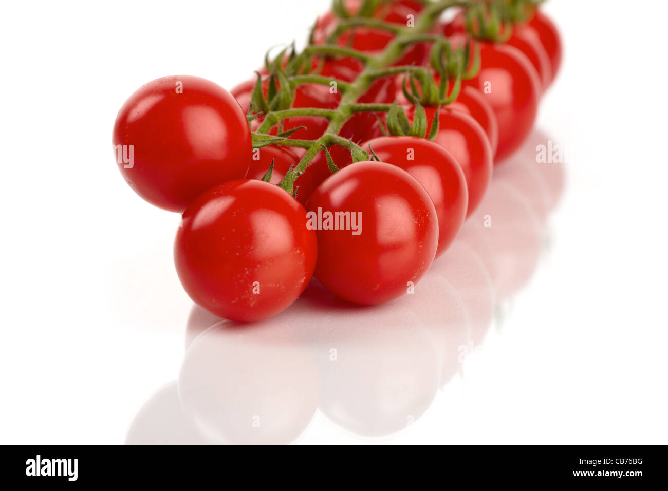 Fresh red ripe cherry tomatoes isolated on white background Stock Photo ...