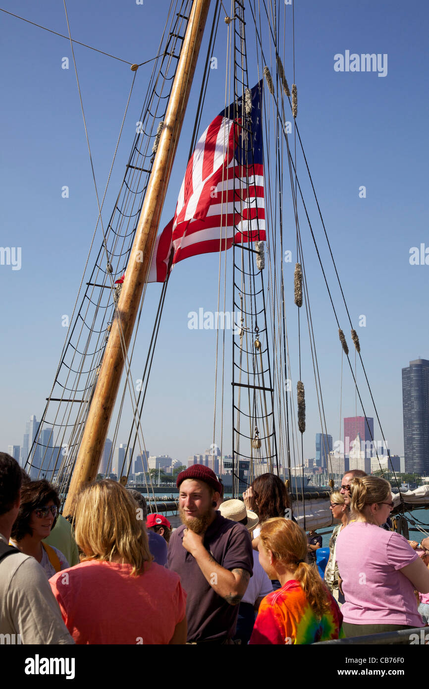 Tourists waiting to board tall ship Friends Good Will. Bearded man is crew member. Tall Ships 2011, Navy Pier, Chicago, Illinois Stock Photo