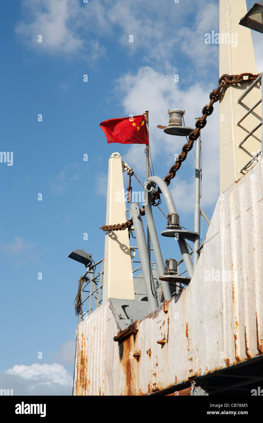 Chinese flag flying on fishing trawler. Stock Photo