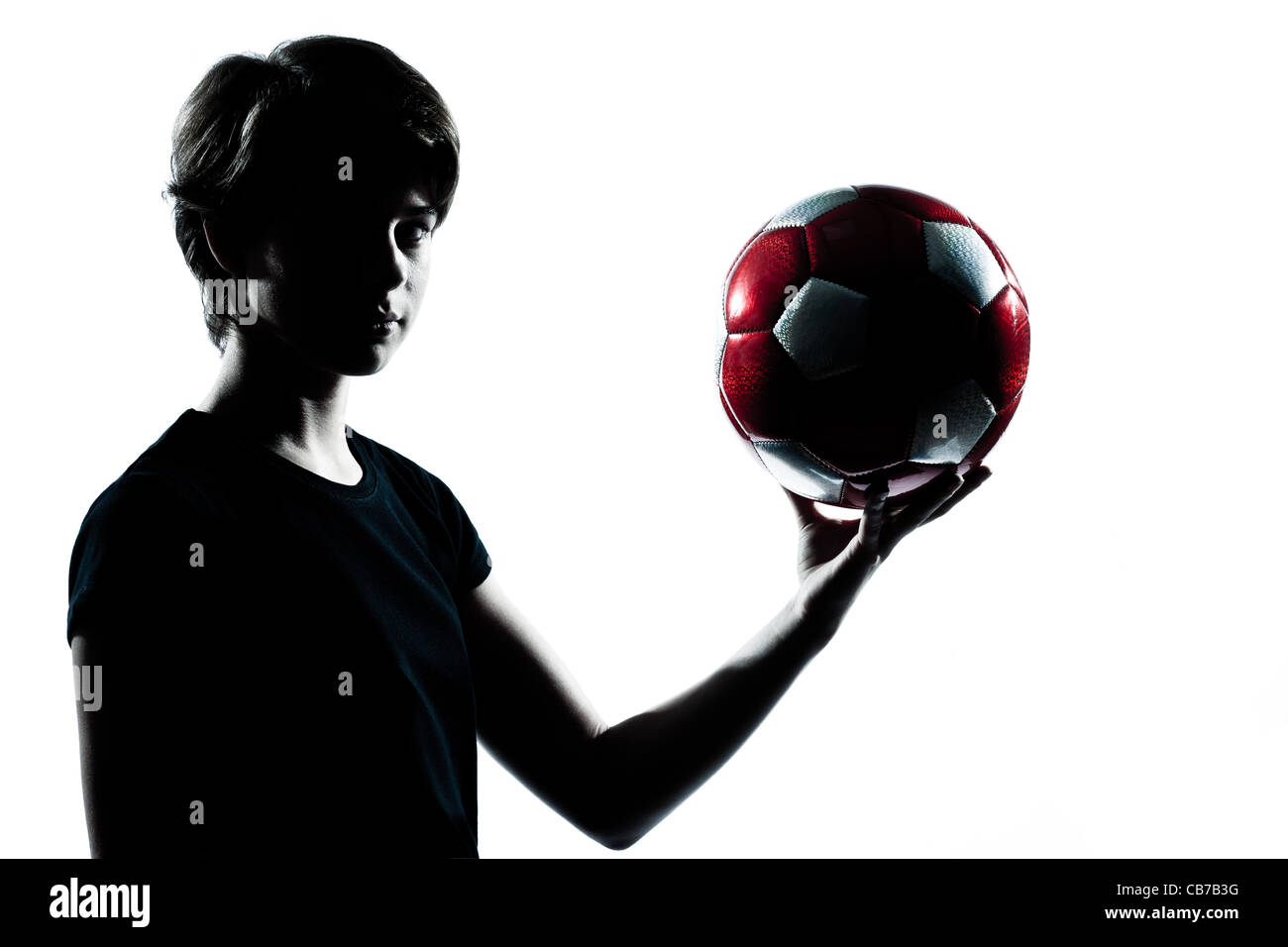 One Young Teenager Silhouette Boy Girl Holding Showing Soccer Football Portrait In Studio Cut Out Isolated On White Background Stock Photo Alamy