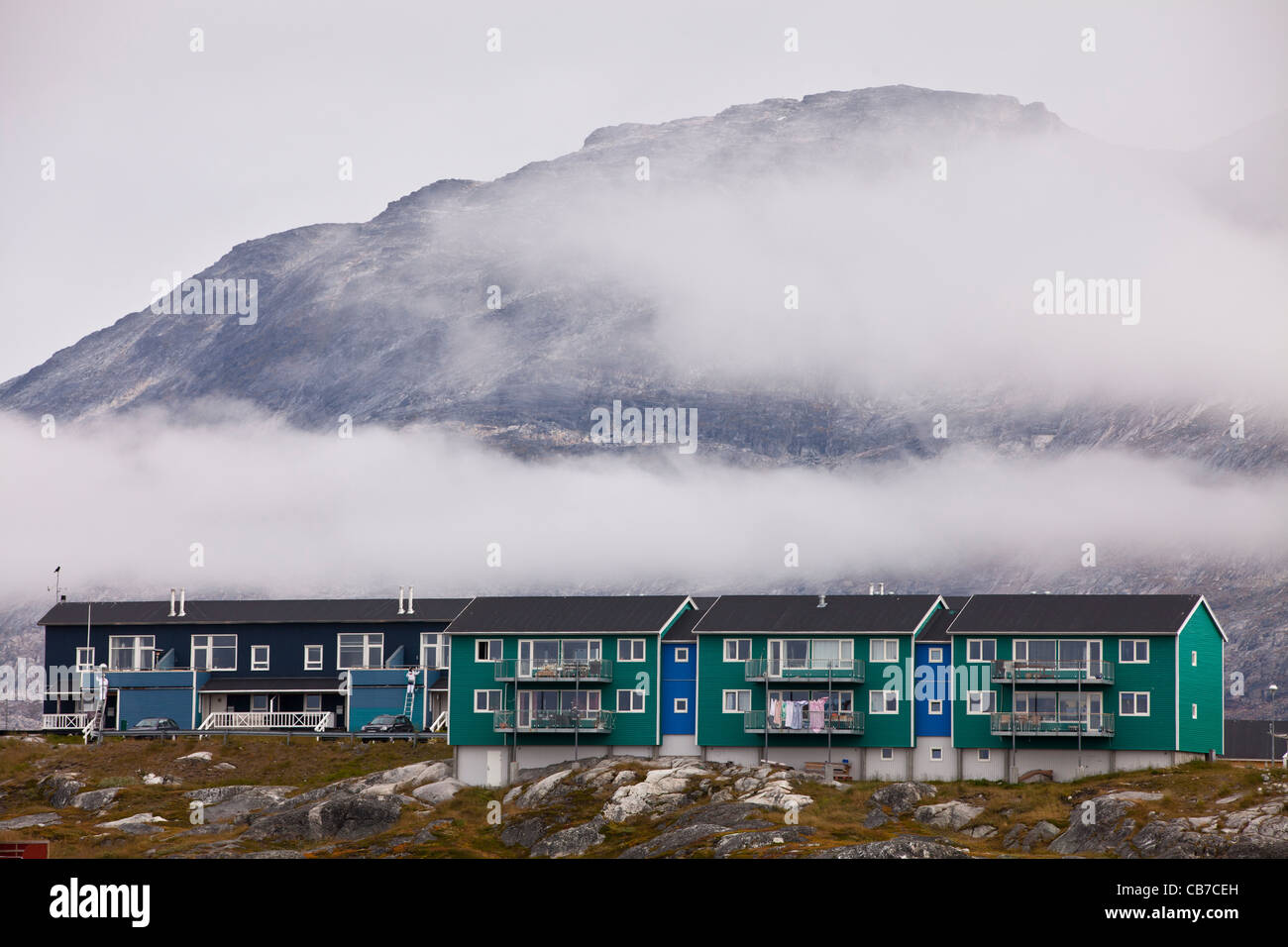 apartment buildings, mountains and fog, Nuuk, Greenland Stock Photo Alamy