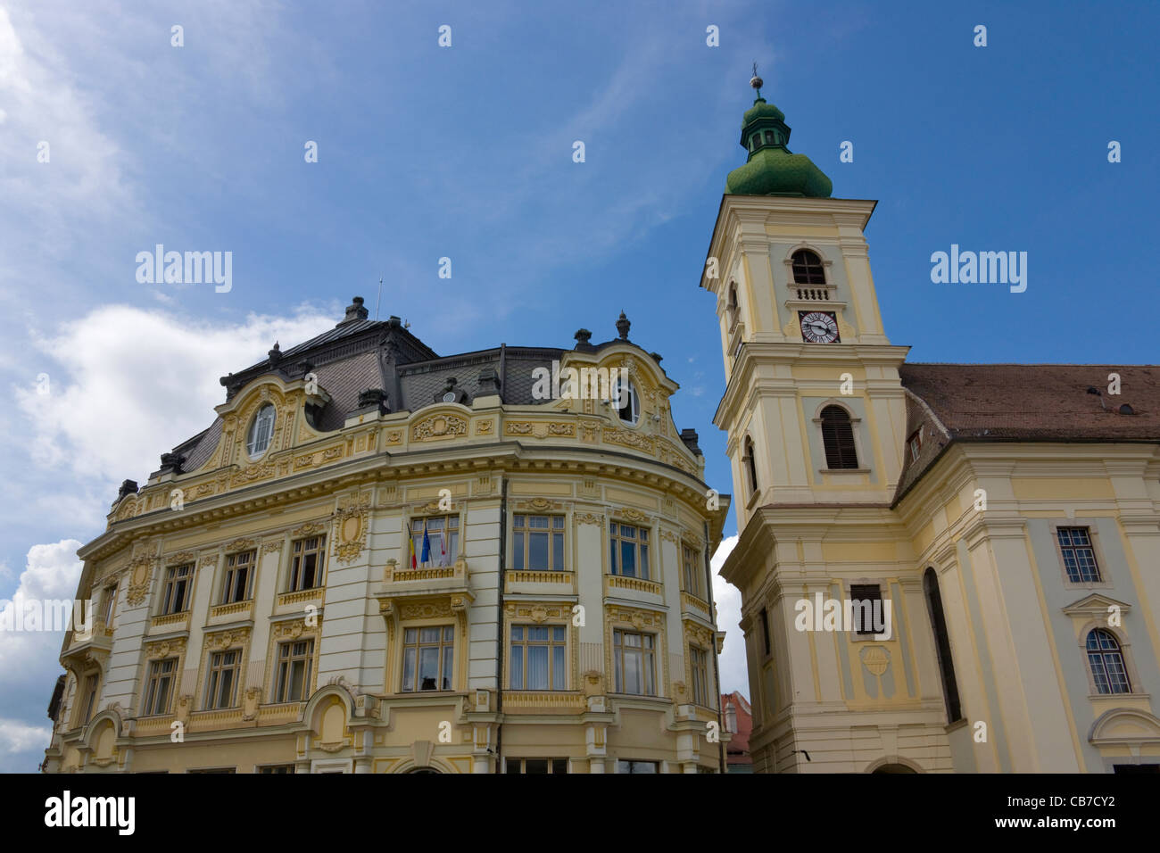 Clock Tower and old house in Mare Square, Sibiu, Romania Stock Photo