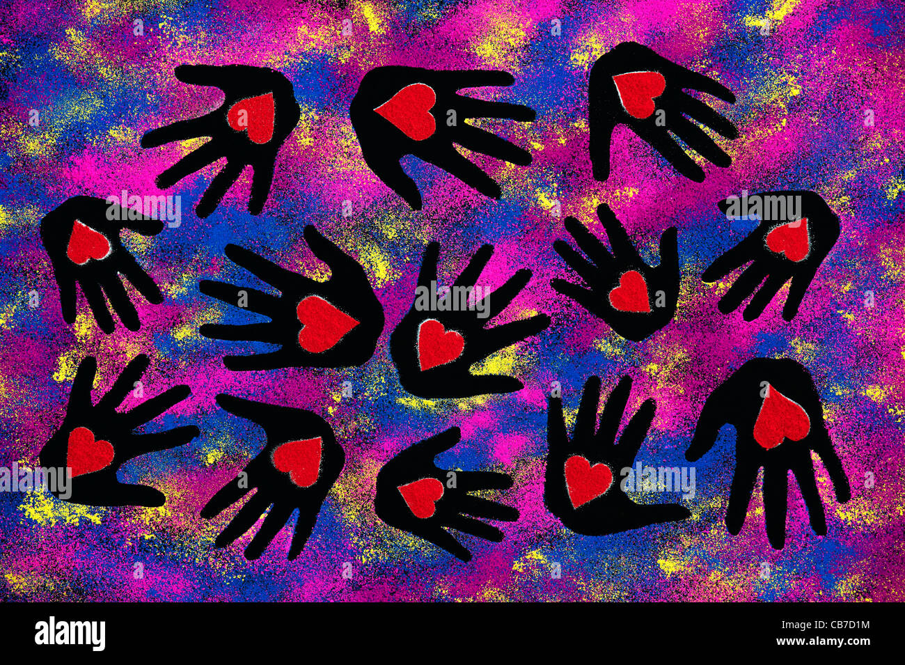 Childs hand prints with red heart shapes made with coloured powder on a black background Stock Photo