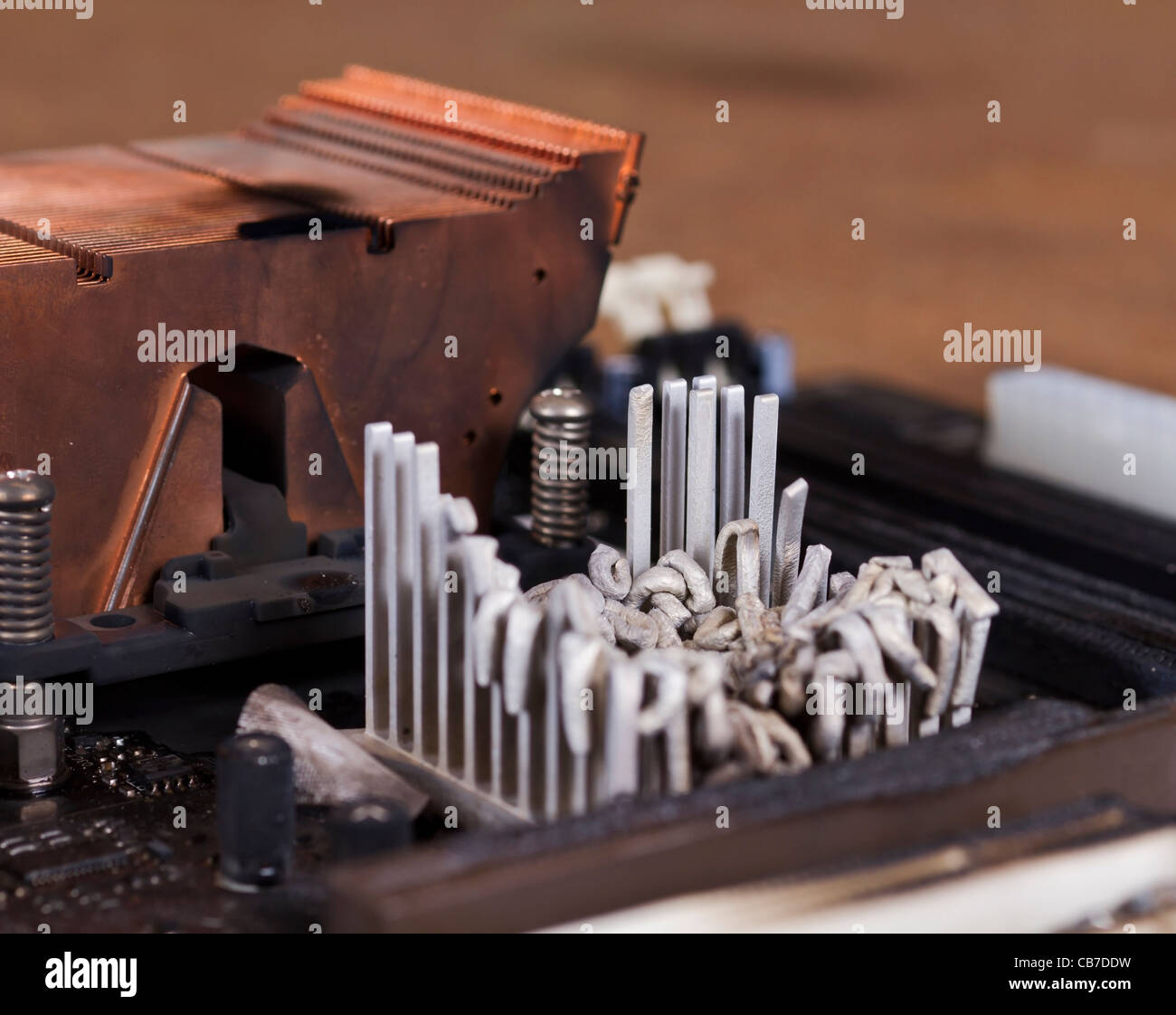 main board detail with molten heat sink Stock Photo