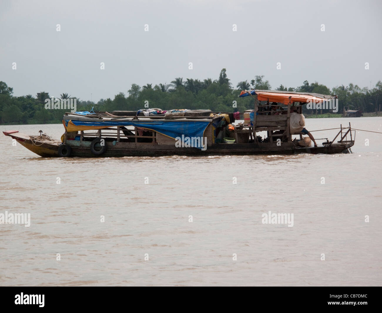 River cargo boat in the Mekong Delta, Vietnam, Mekong River Stock Photo