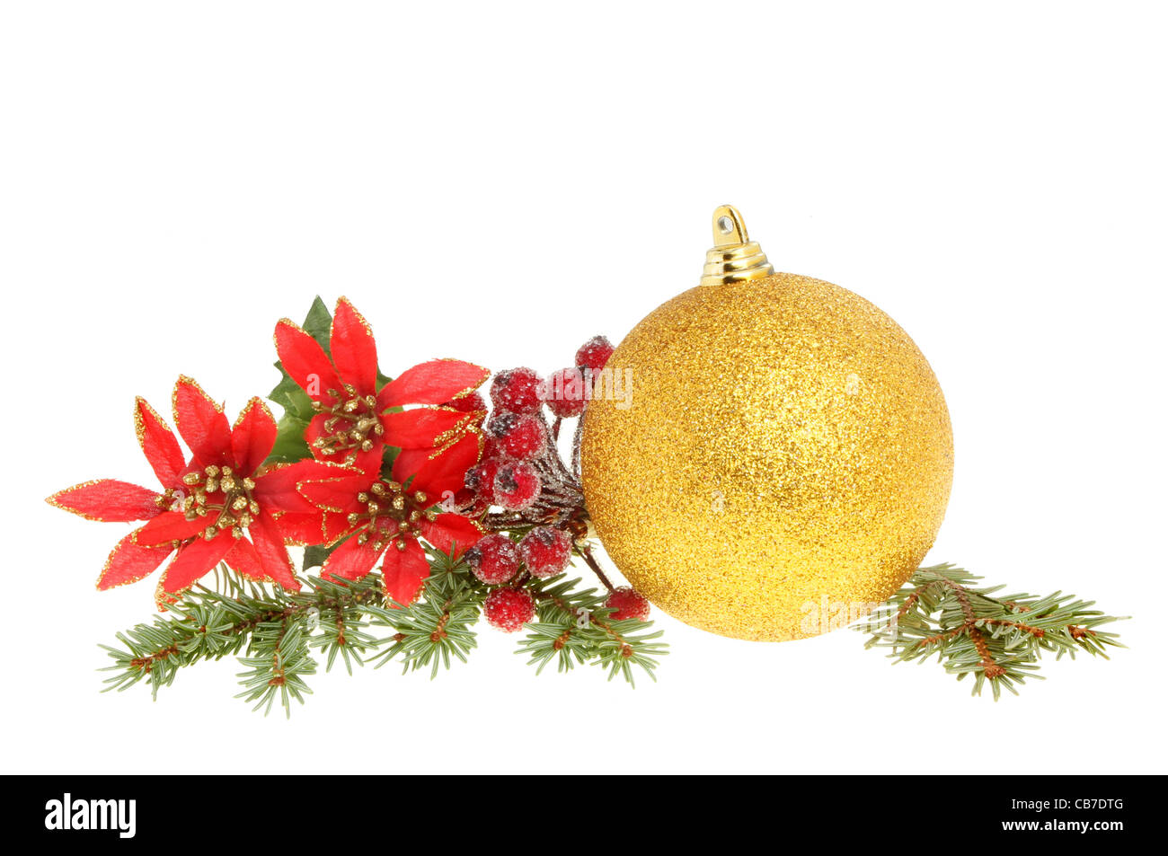 Gold glitter Christmas bauble and seasonal foliage isolated against white Stock Photo