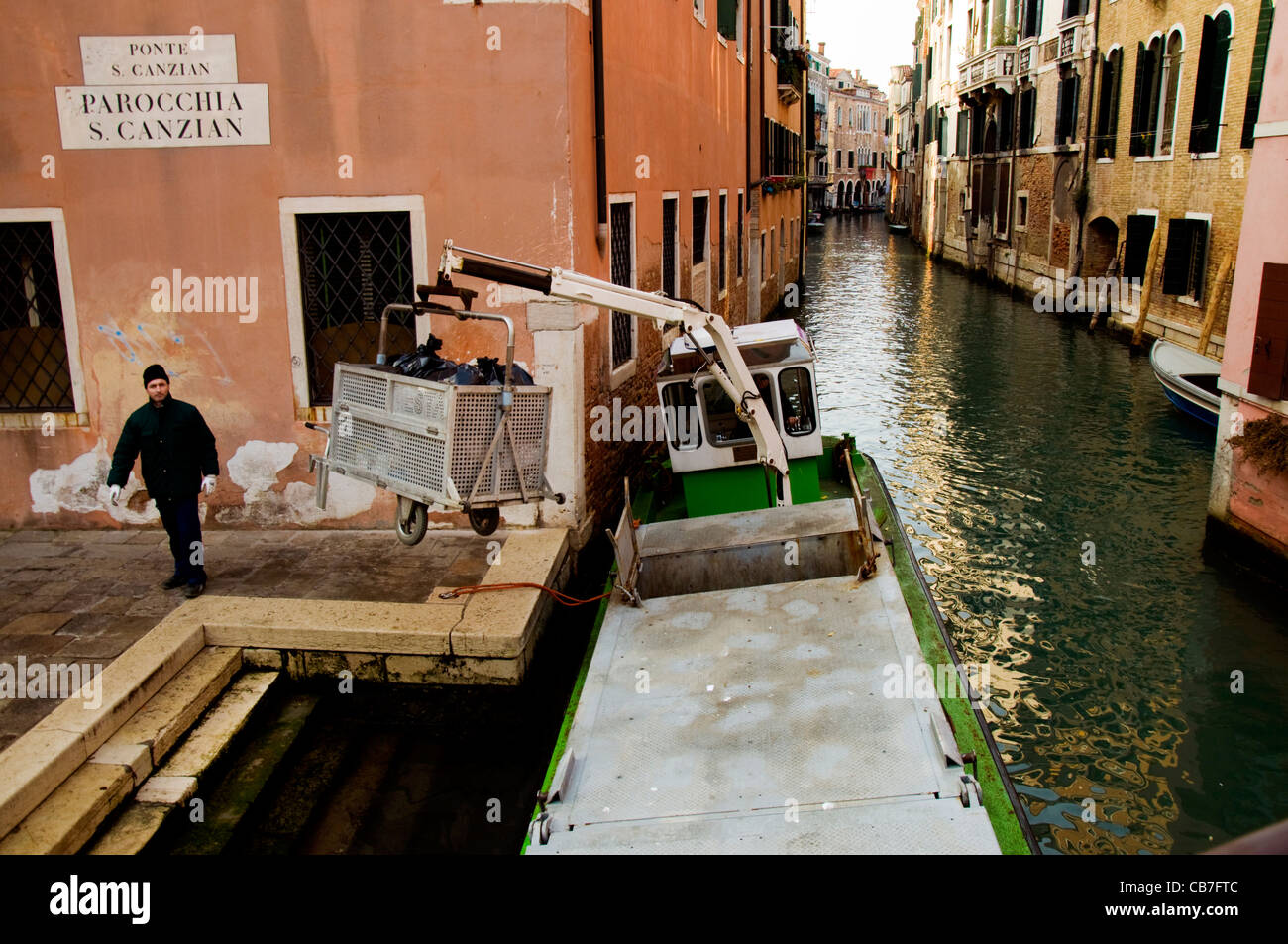 Italian public sector workers garbage rubbish collectors at work in Venice Stock Photo