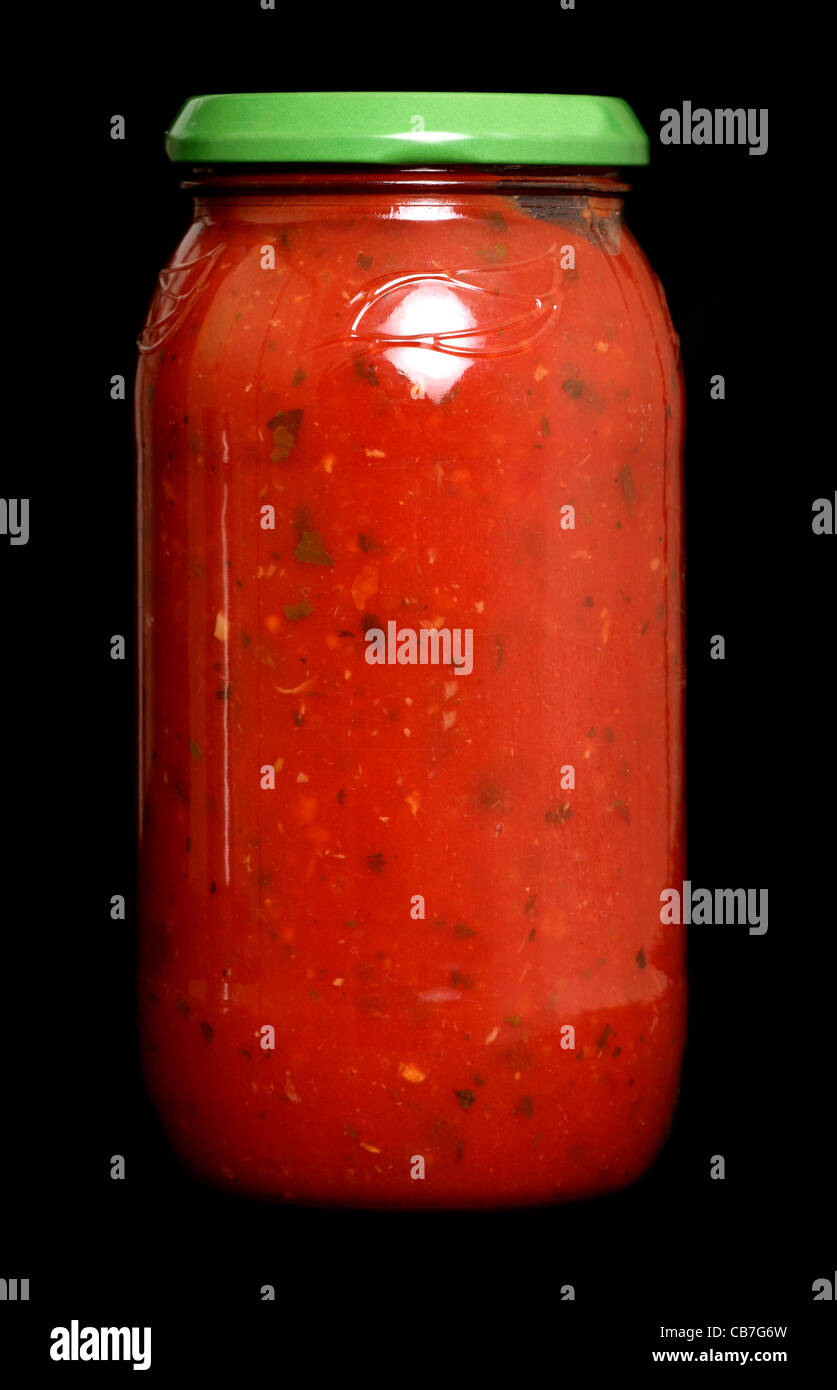 Pasta sauce in a jar on black background Stock Photo Alamy