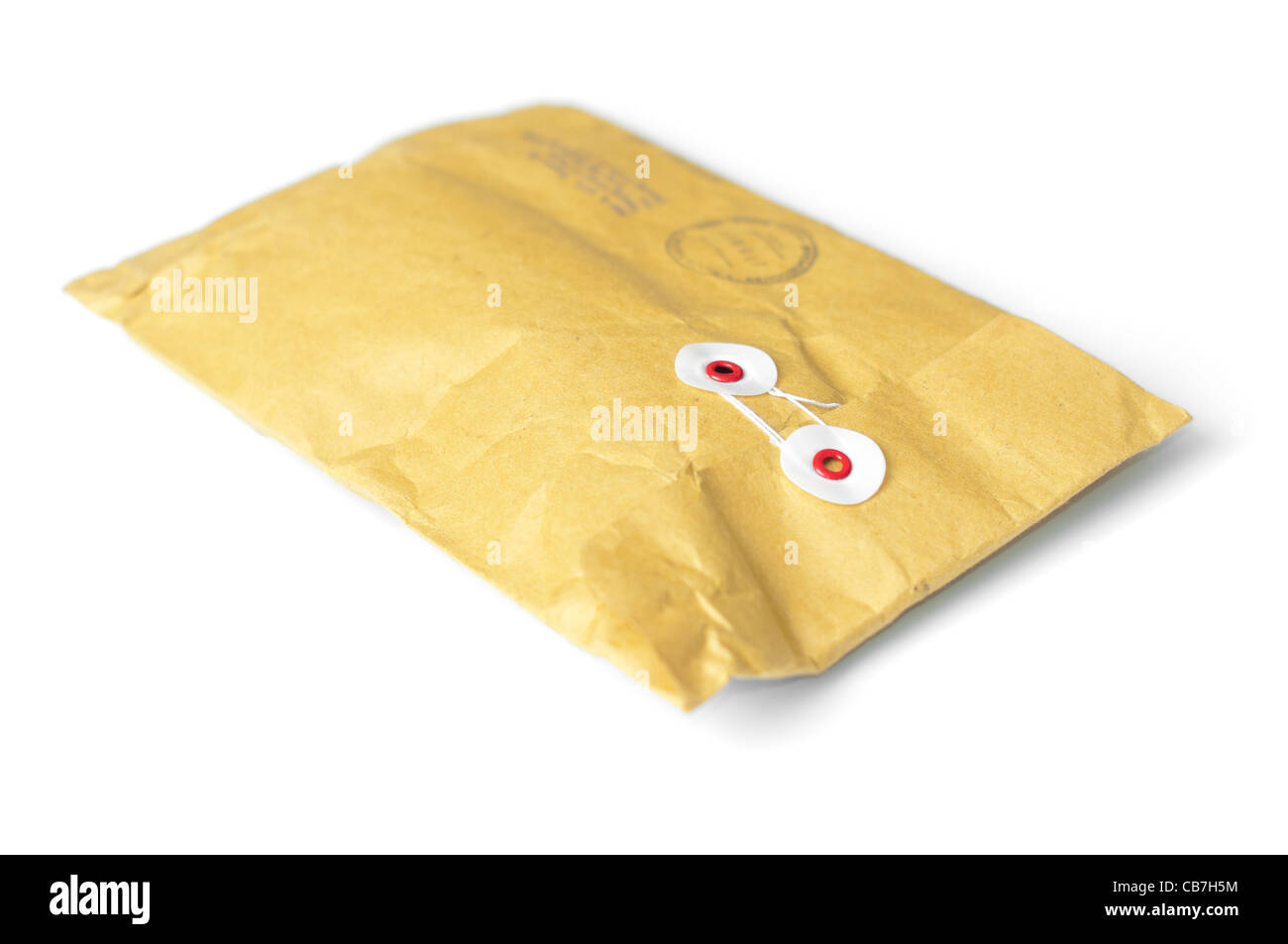 closed yellow mail parcel isolated on white background Stock Photo - Alamy
