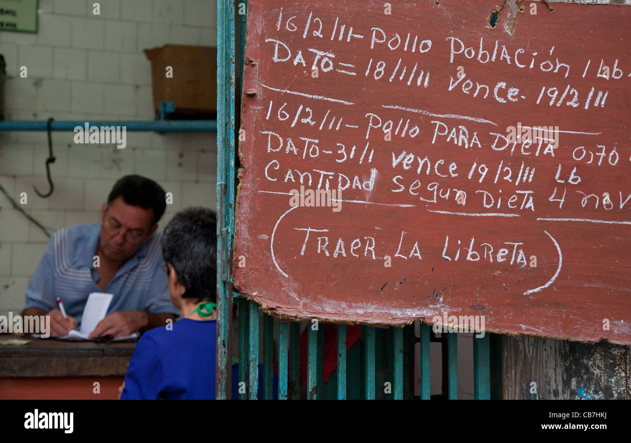 Sign specifies the amount of chicken 1 pound per person, Havana (La Habana), Cuba Stock Photo